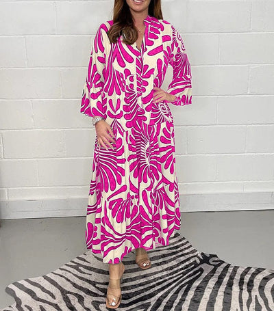 Emryn - Long women's dress with V-neck and floral pattern