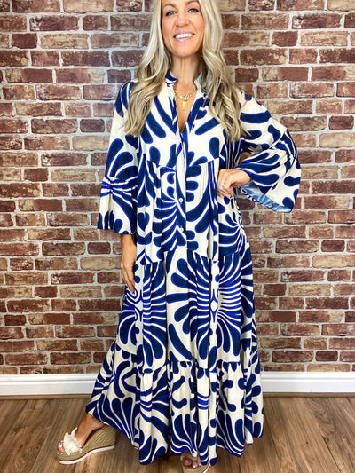 Emryn - Long women's dress with V-neck and floral pattern